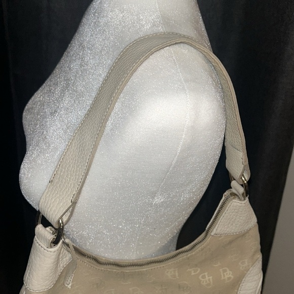 Dooney and Bourke vintage hobo purse in the color cream. - Picture 4 of 14